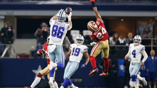 Dallas Cowboys tight end Dalton Schultz (86) catches a pass against San Francisco 49ers defensive back K'Waun Williams (24) in the fourth quarter in a NFC Wild Card playoff football game at AT&T Stadium.